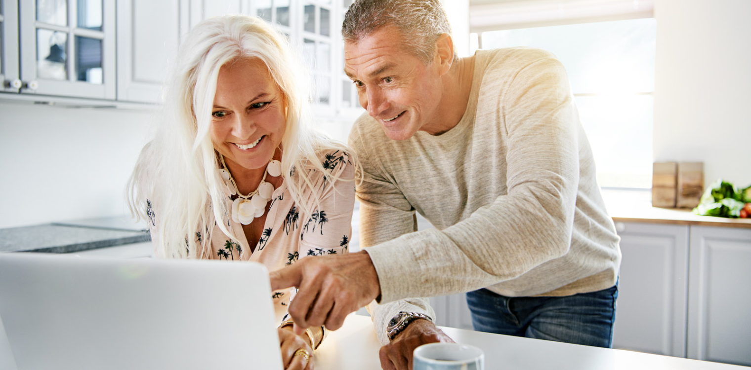 two people on laptop