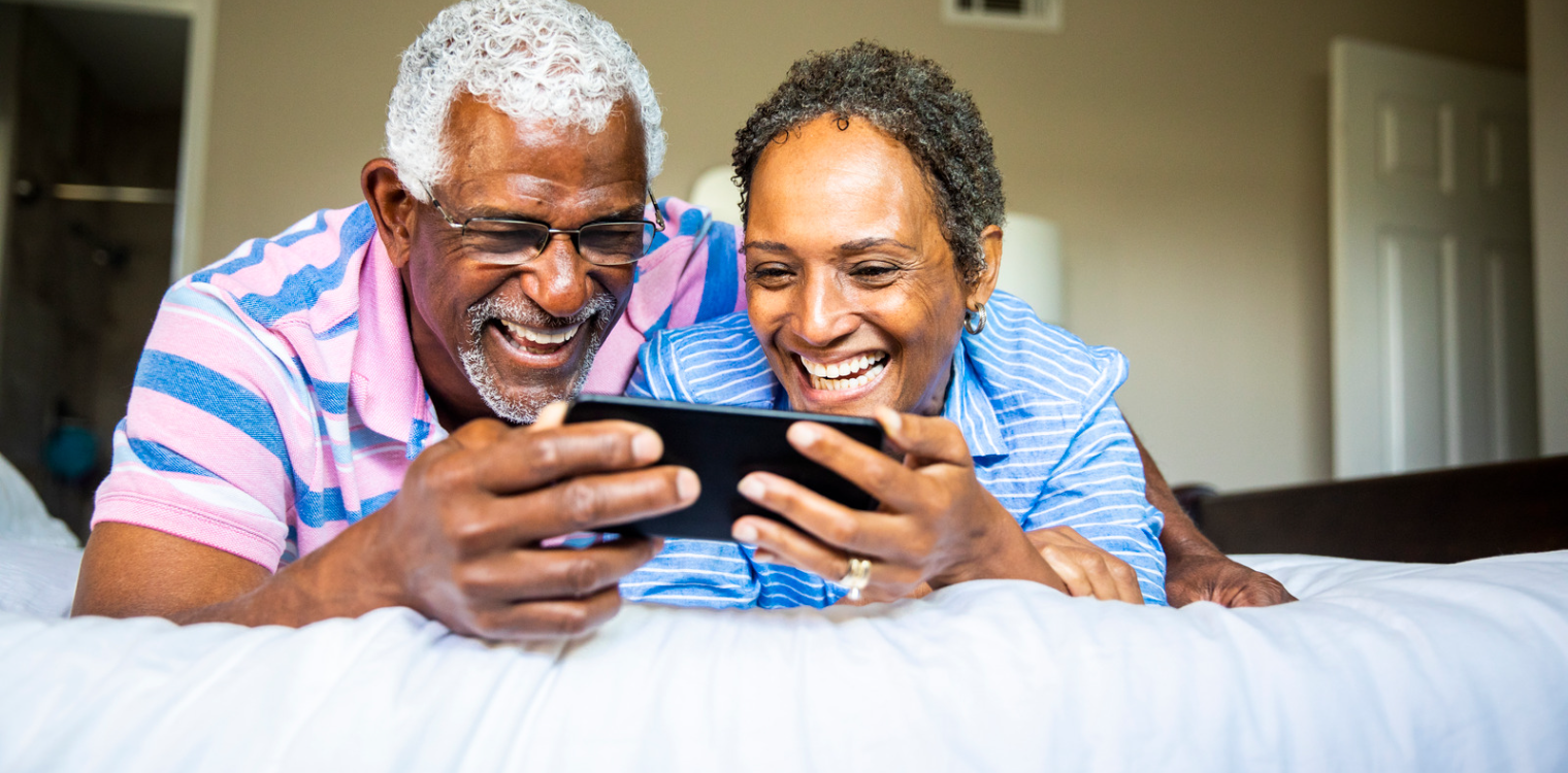 two people watching phone